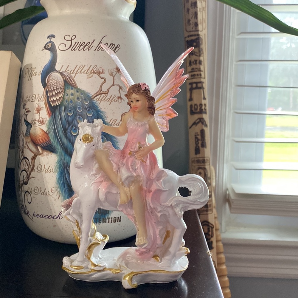 Home Decoration angel figurine together with the horse.